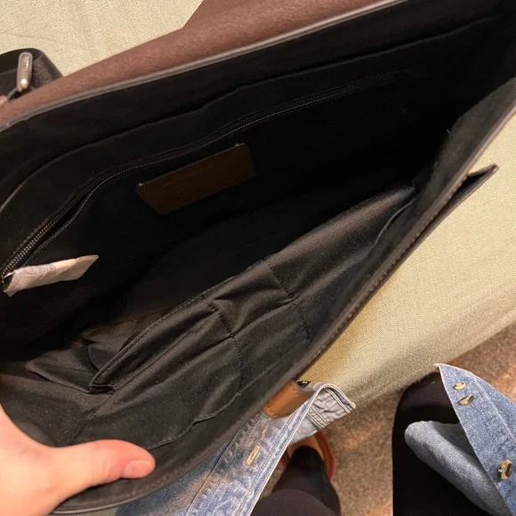 Mens Coach laptop bag. NEVER used. No tag, it was a gift. Perfect condition.